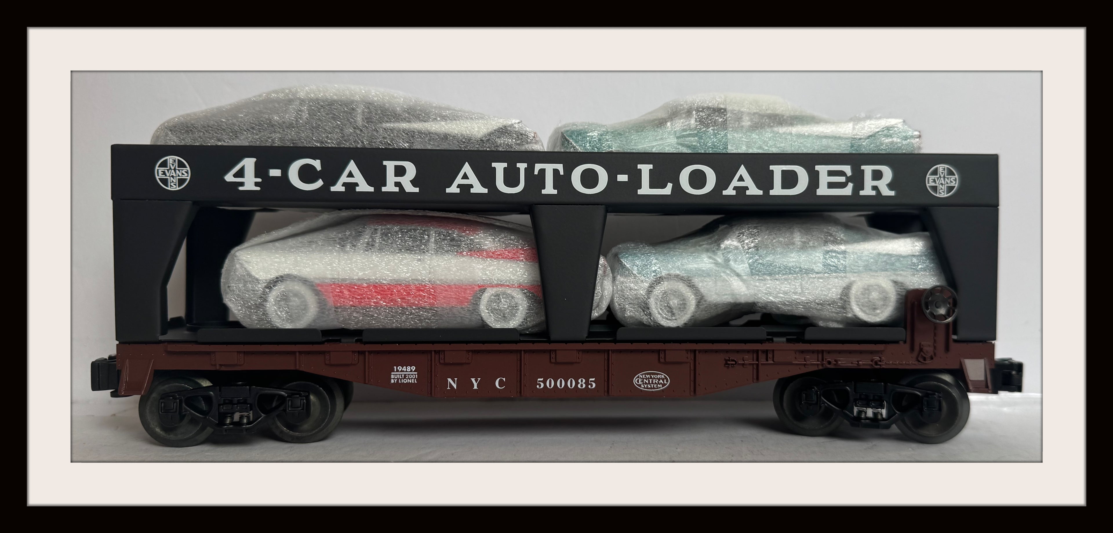 Lionel Evans 4 Car Auto Loader # 500085 with 4 Route 66 Die Cast Cars