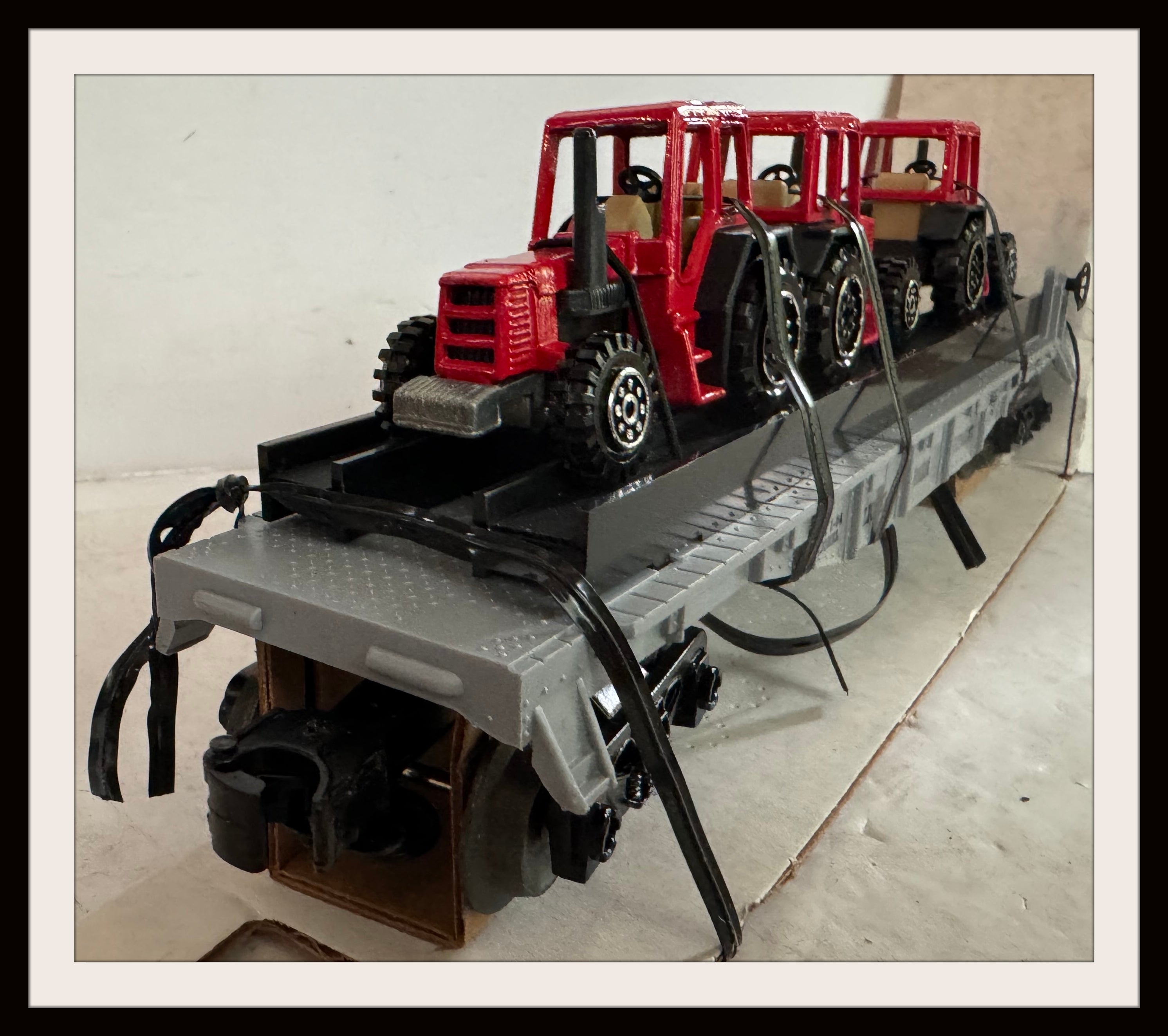 Lionel Flatcar with 3 Farm Tractors # 6-16907