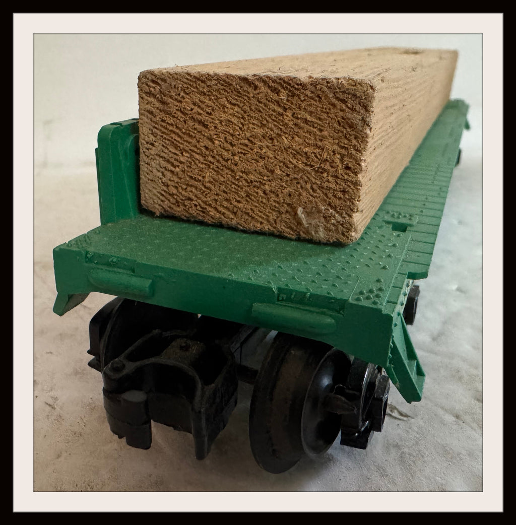 Lionel P L & E # 9124 Flat Bed with Load